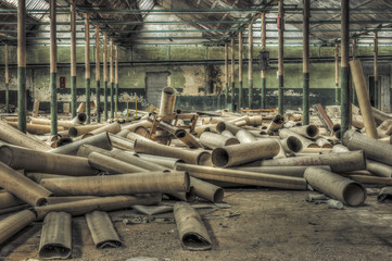Cardboard rolls in an abandoned warehouse