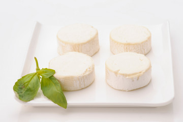 Lots of goat cheese with basil