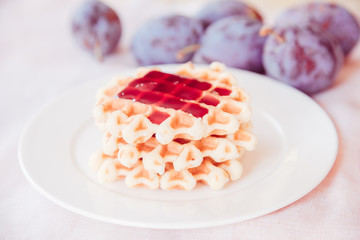 Belgian waffle with plum jam