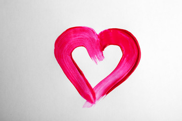 Painted heart on white paper background