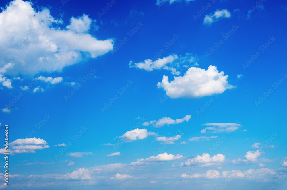 Wall mural blue sky background with white clouds