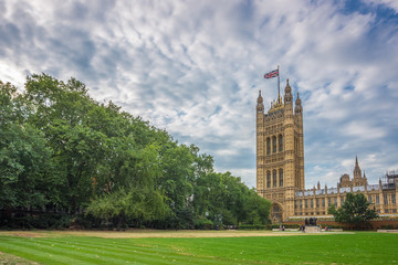 Palace of Westminster, Houses of Parliament and Victoria Tower shot from Victoria Tower Gardens, London, UK