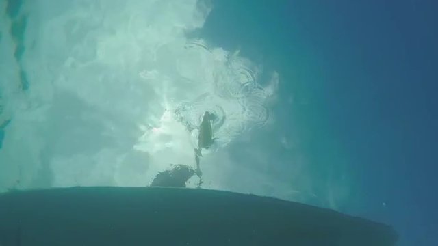 UNDERWATER: SUP boarding in crystal clear ocean