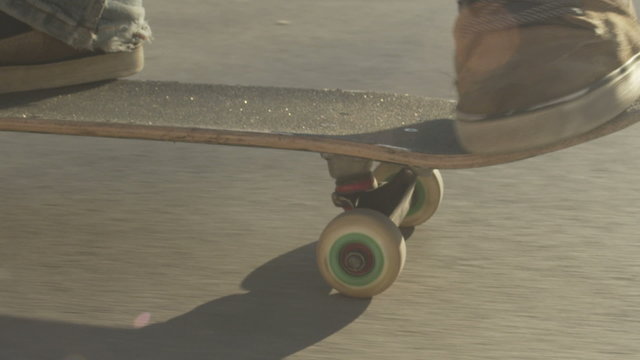 SLOW MOTION: Close-up skateboarding