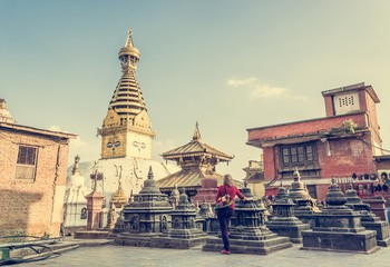 Woman looking at temple.