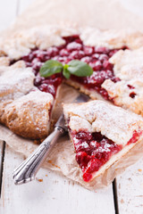 Homemade galette with cherries.selective focus