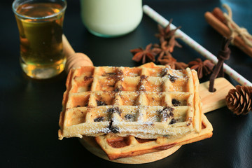 tasty waffle with milk