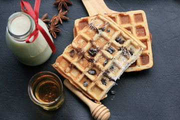 tasty waffle with milk