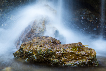 Waterfall With A Stone