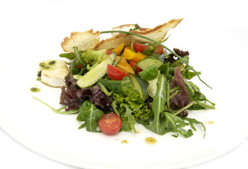 salad vegetables and goat cheese on a white background