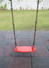 Empty swings on playground