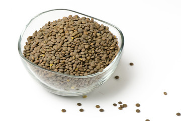 Bowl raw lentils, food background