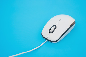 white mouse on a blue background