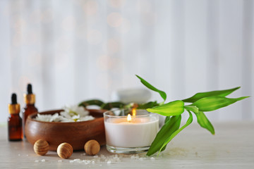 Beautiful composition of spa treatment on wooden table