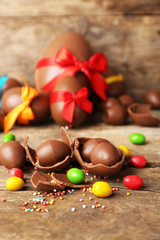 Chocolate Easter eggs on wooden background