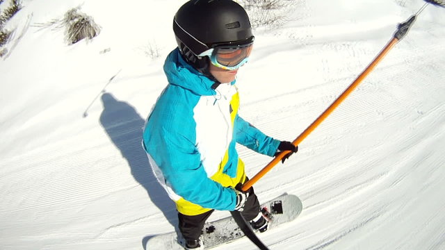 Snowboarder on ski lift