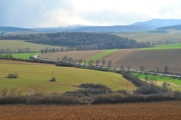 Fototapeta premium Farmland around Saris castle hill.