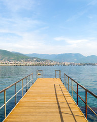 Fototapeta na wymiar Wooden pier in Mediterranean sea, Turkey