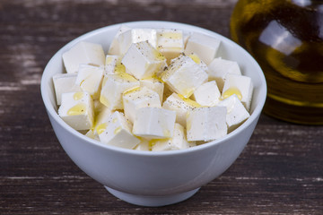 White greek cheese in plate, close up
