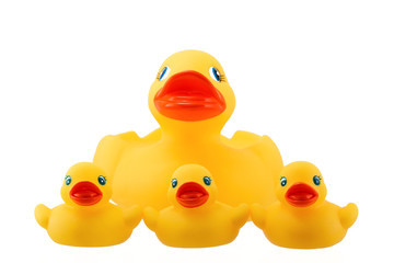 Rubber duck family with three little ducky isolated on white