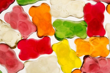 Colorful gummy bears or jellybears candies over white