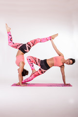 Acrobatic yoga on white background