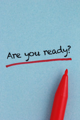 Are you ready - text written on the blue paper, very visible paper texture
