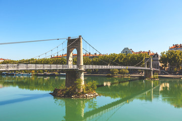 Old Passerelle du College bridge over Rhone river in Lyon, Franc