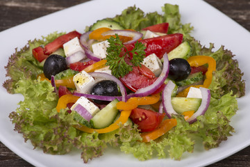 Fresh vegetable greek salad on the table