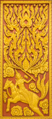 Fototapeta na wymiar Thai wooden statues in the temple