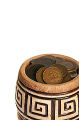 A pot of money, old silver and copper coins isolated on white ba