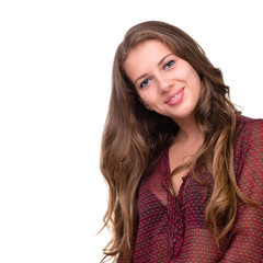 Naklejka premium Beautiful woman portrait smiling - isolated over a white