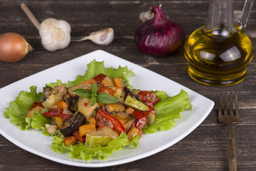 Roasted vegetables on a white plate