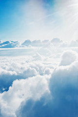 Aerial view on white fluffy clouds