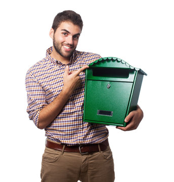 A handsome young man holding a malbox