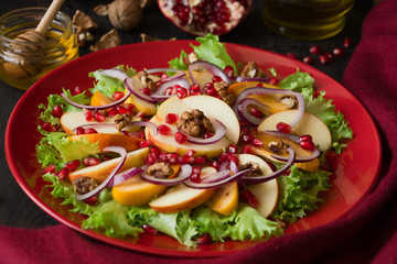 Fresh fruit salad with persimmons and garnet