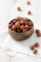 hazelnuts in a wooden bowl