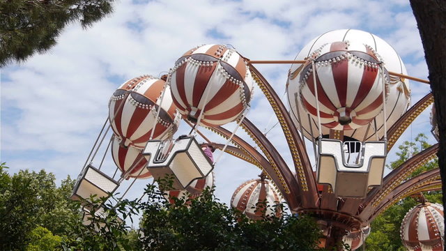 SLOW  MOTION: Amusement park attraction