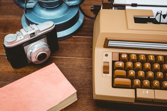 View of an old typewriter and camera