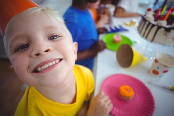 Excited kid enjoying a birthday party