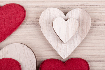 valentine's wooden hearts on a retro background