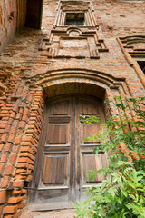 Fototapeta na wymiar Wooden door in old tower.