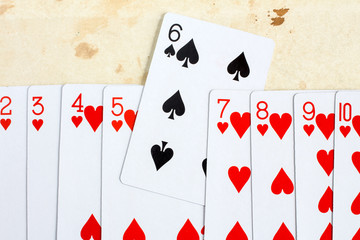 Red hearts and one black spade