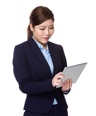 Asian businesswoman use of the tablet pc