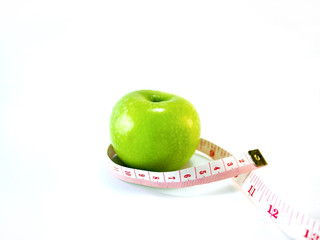 Green apple with measure