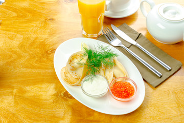 Pancakes with caviar