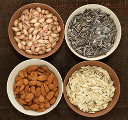 Veriety of nuts into balls on sacking 