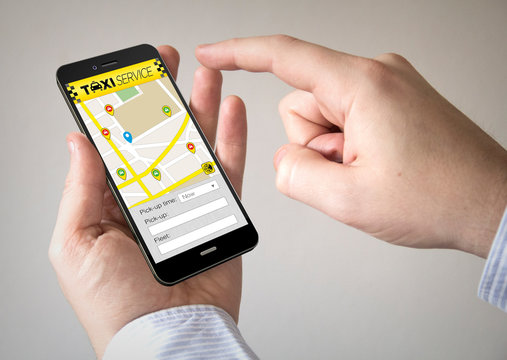  touchscreen smartphone with taxi application on the screen
