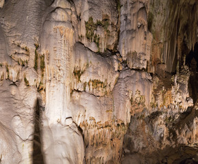 Cave inside with stalactites and stalagmites