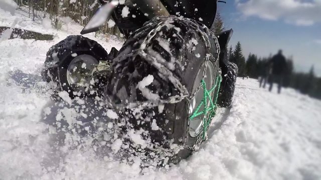 ATV riders on winter snow racing. Super 